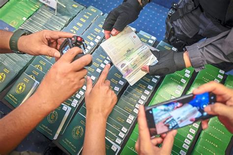 Immigration dept busts syndicate using fake passports for .